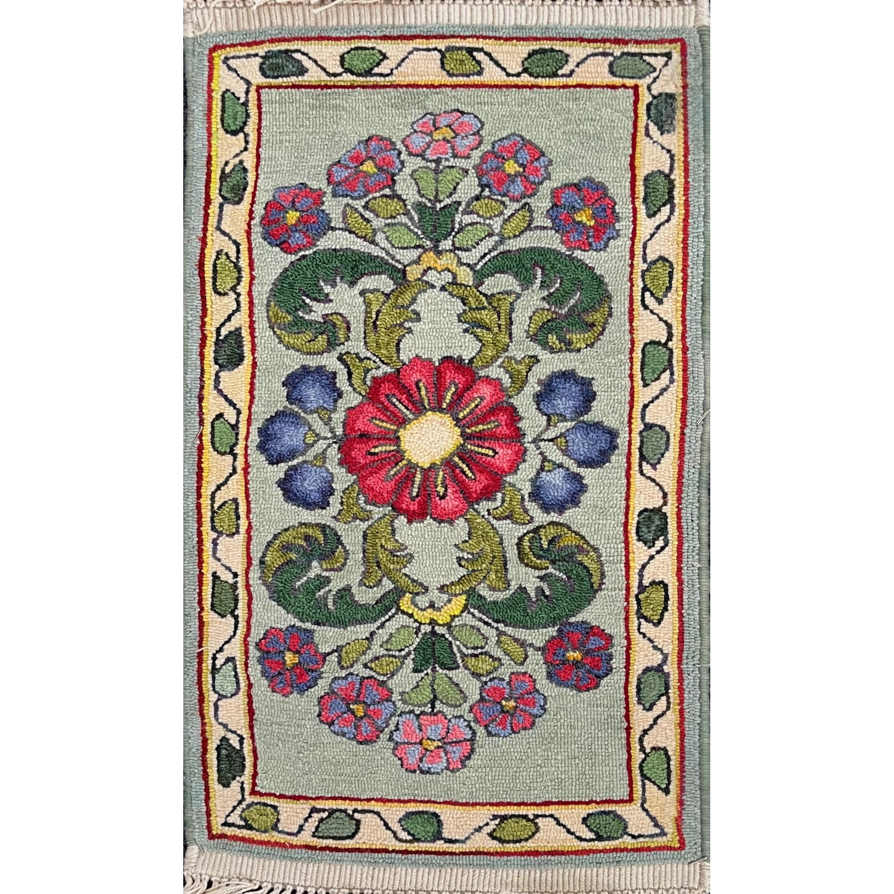 Desert Rose, rug hooked by Jane McGown Flynn