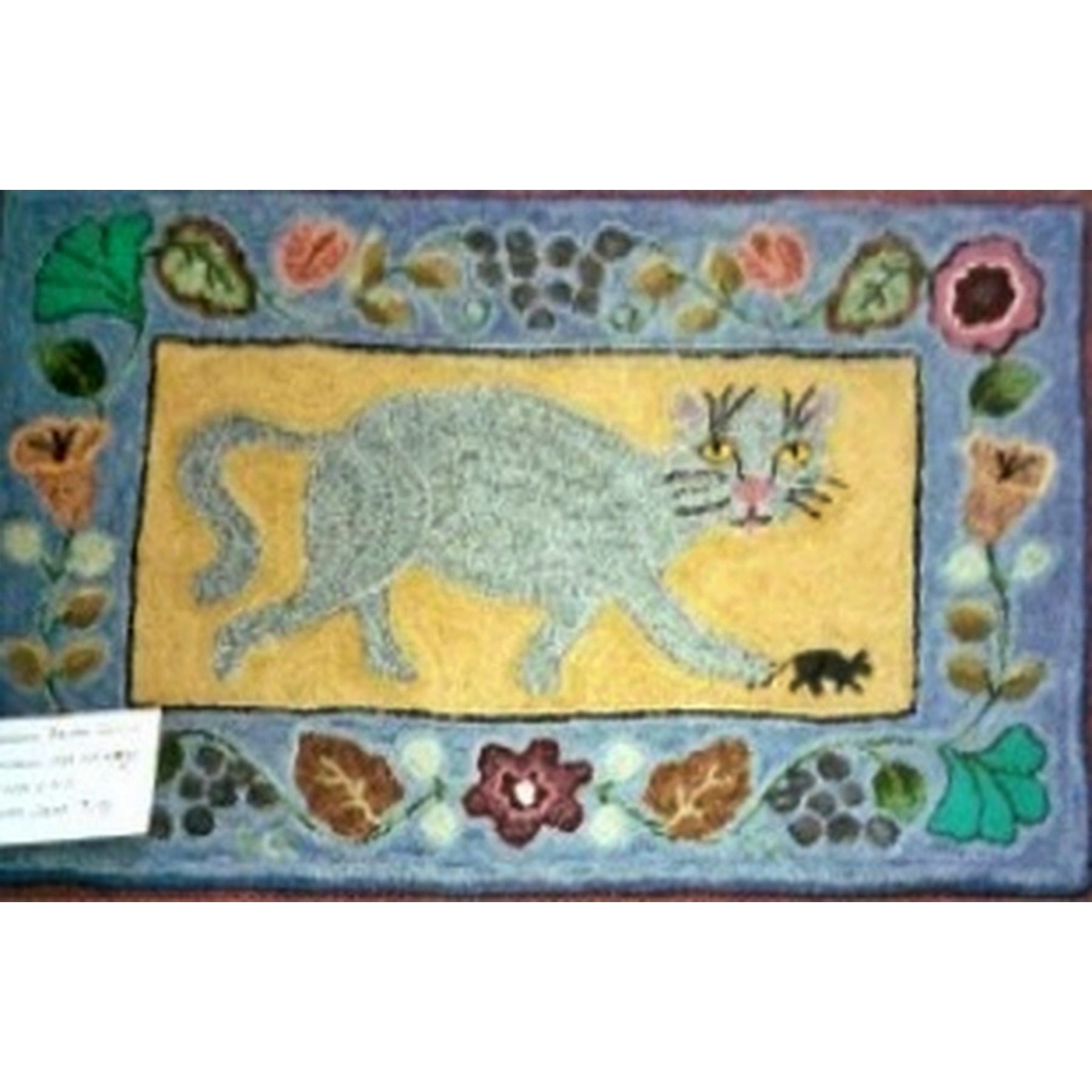 Whimsical Cat, rug hooked by Basha Quilici