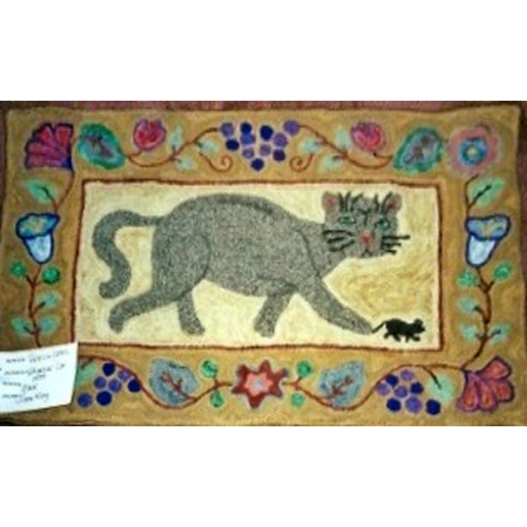 Whimsical Cat, rug hooked by Patricia Yates