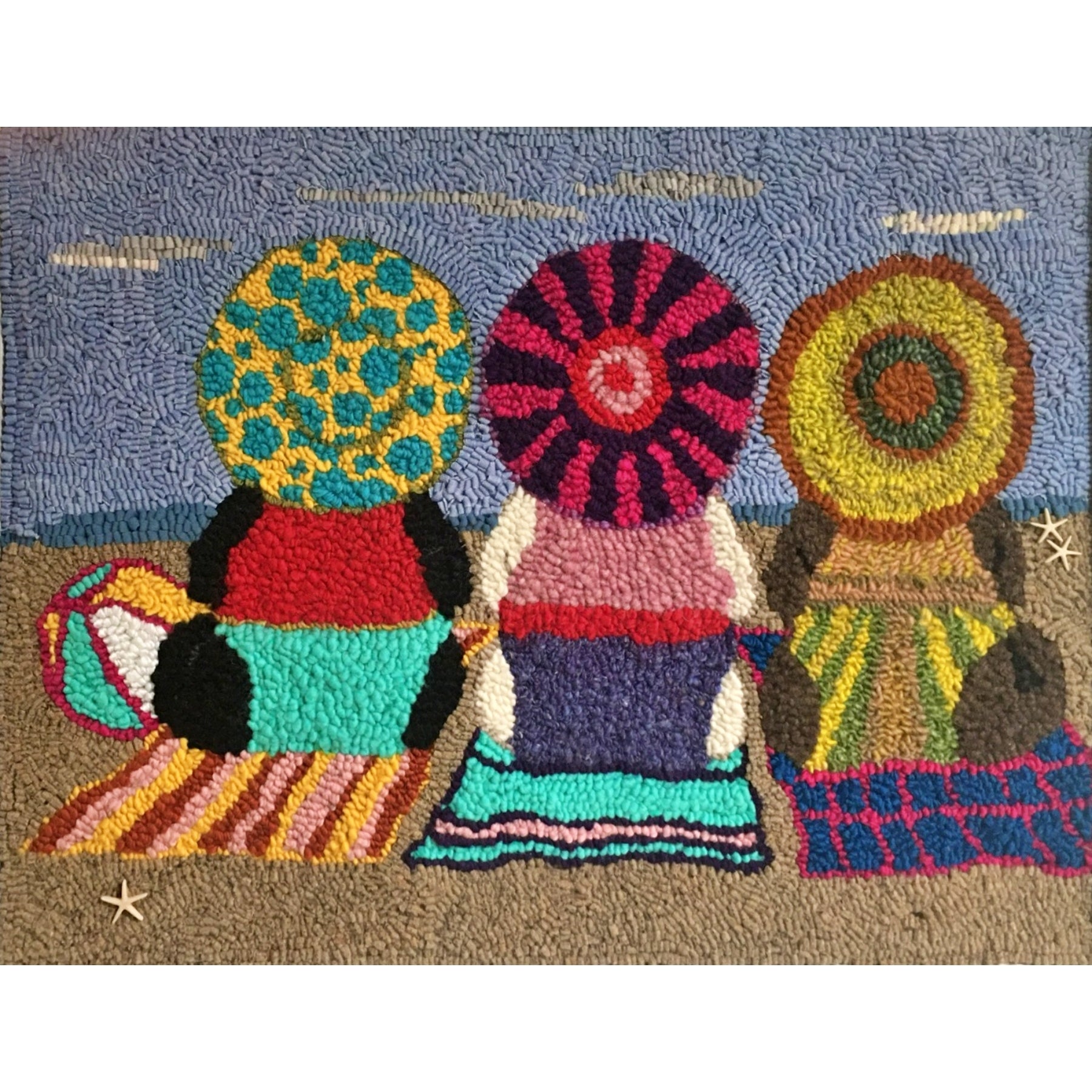 The Girls Catching Some Rays, rug hooked by Patrica Wharton