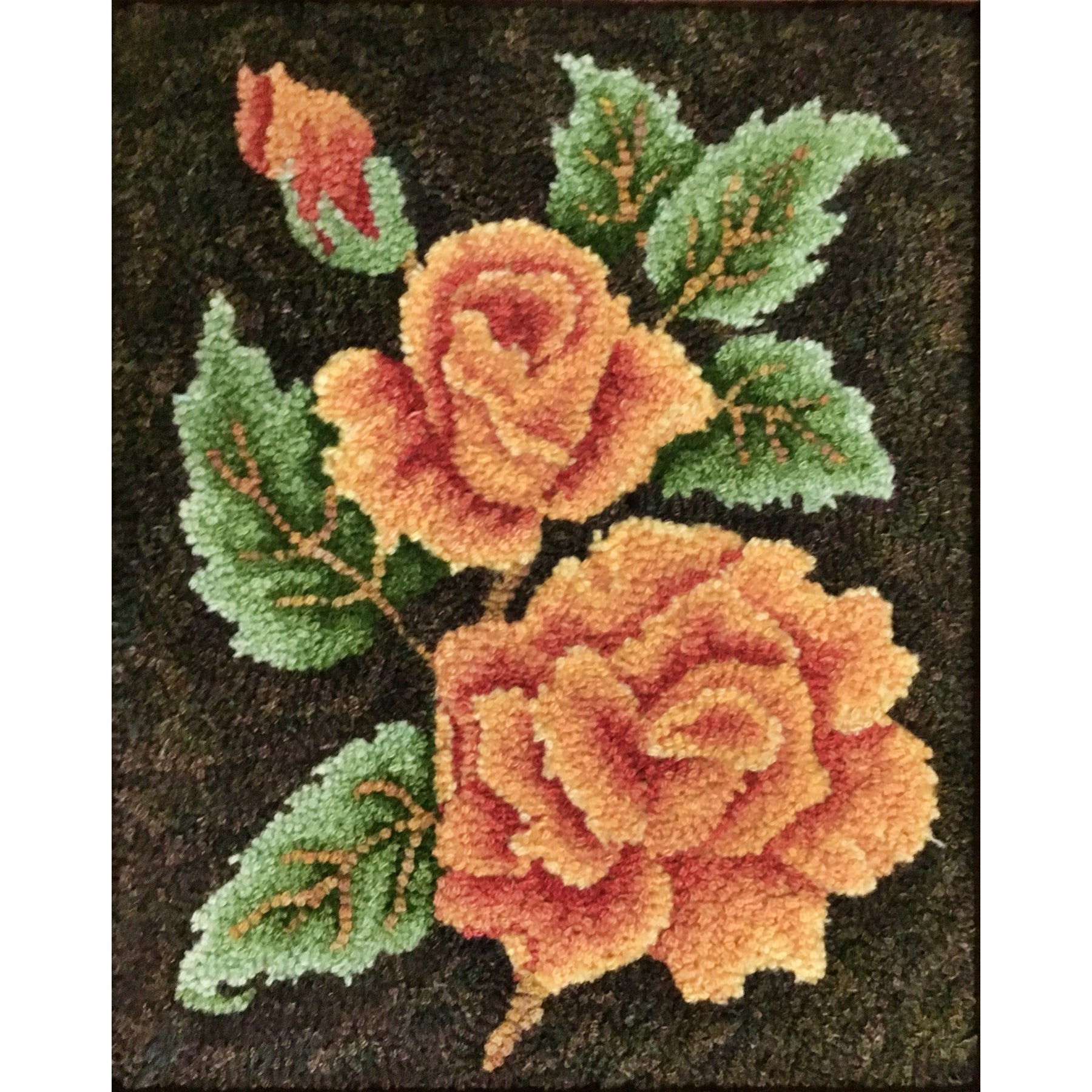 Roses, rug hooked by Beverly Mulcahy