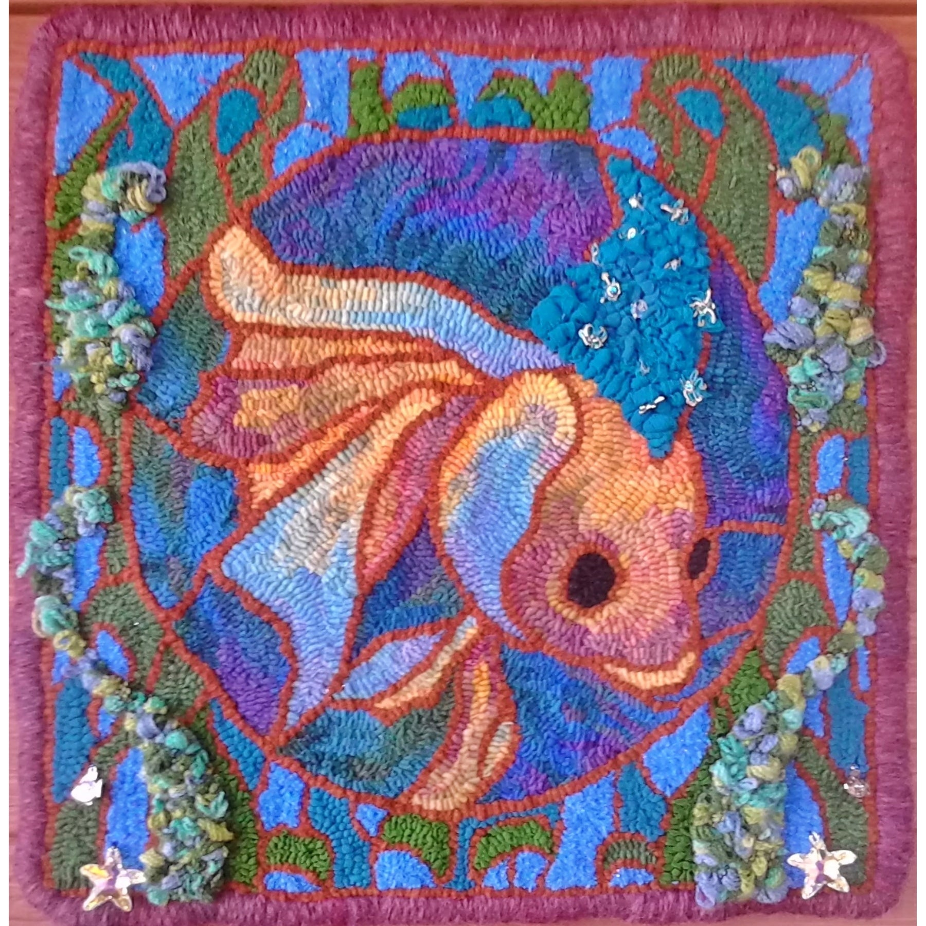 Stained Glass Fish, rug hooked by Mary Jo C Nafzger