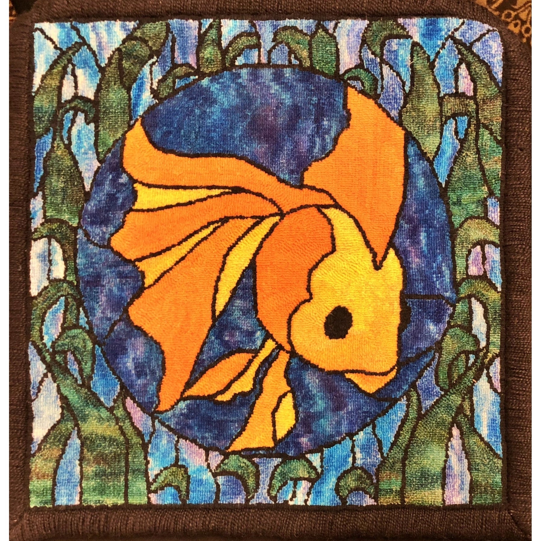 Stained Glass Fish, rug hooked by Sarah Miller