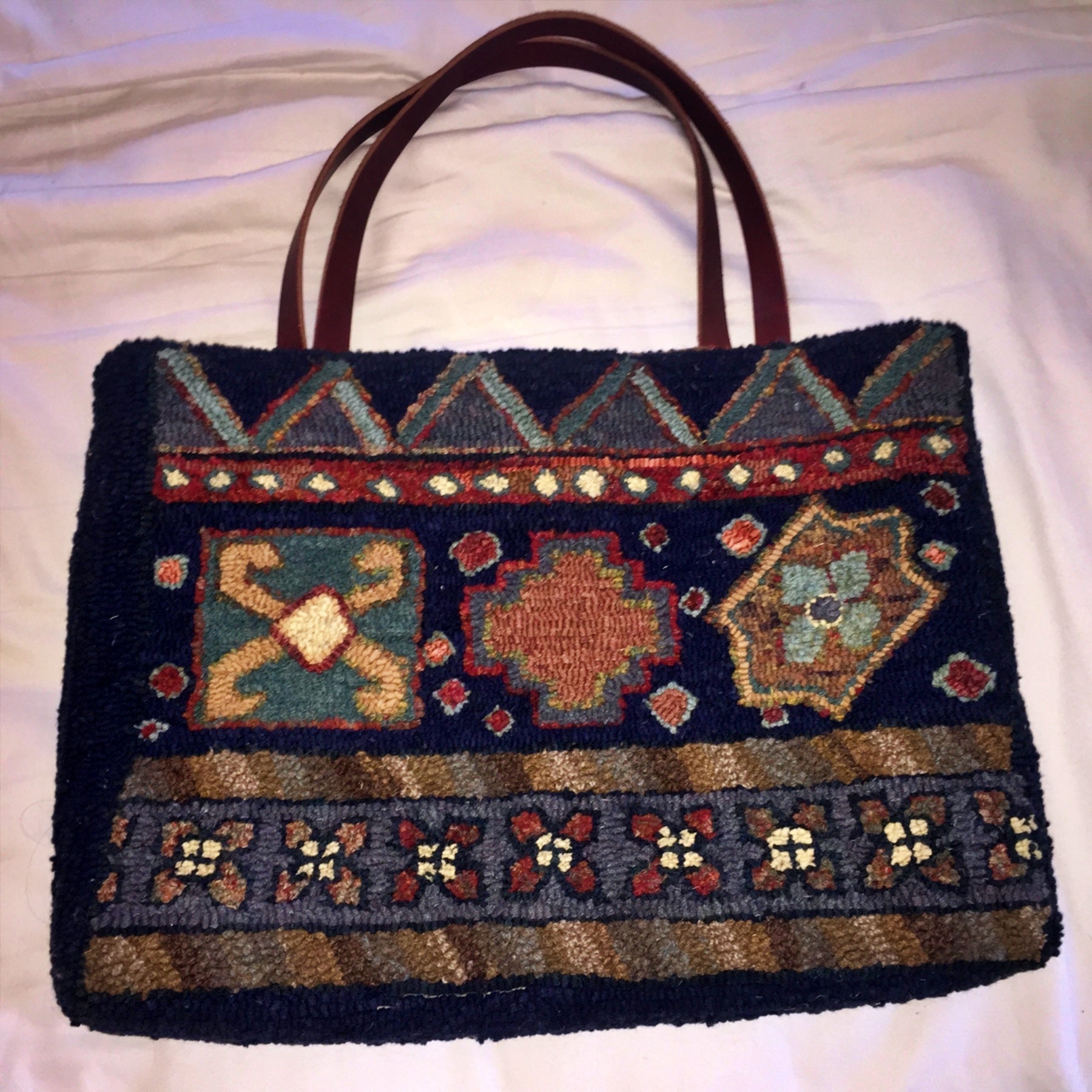 Desert Wanderer Bag, rug hooked by Kathleen McPartlan