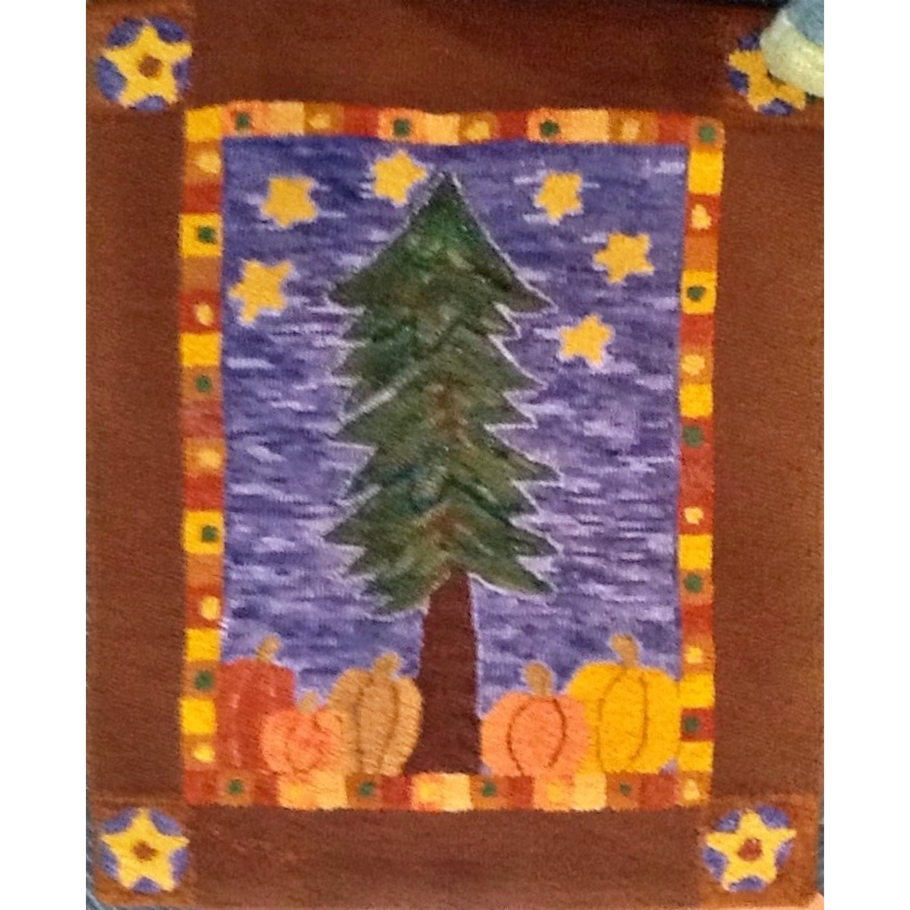 Merry Pumpkin, rug hooked by Kathy Kovaric