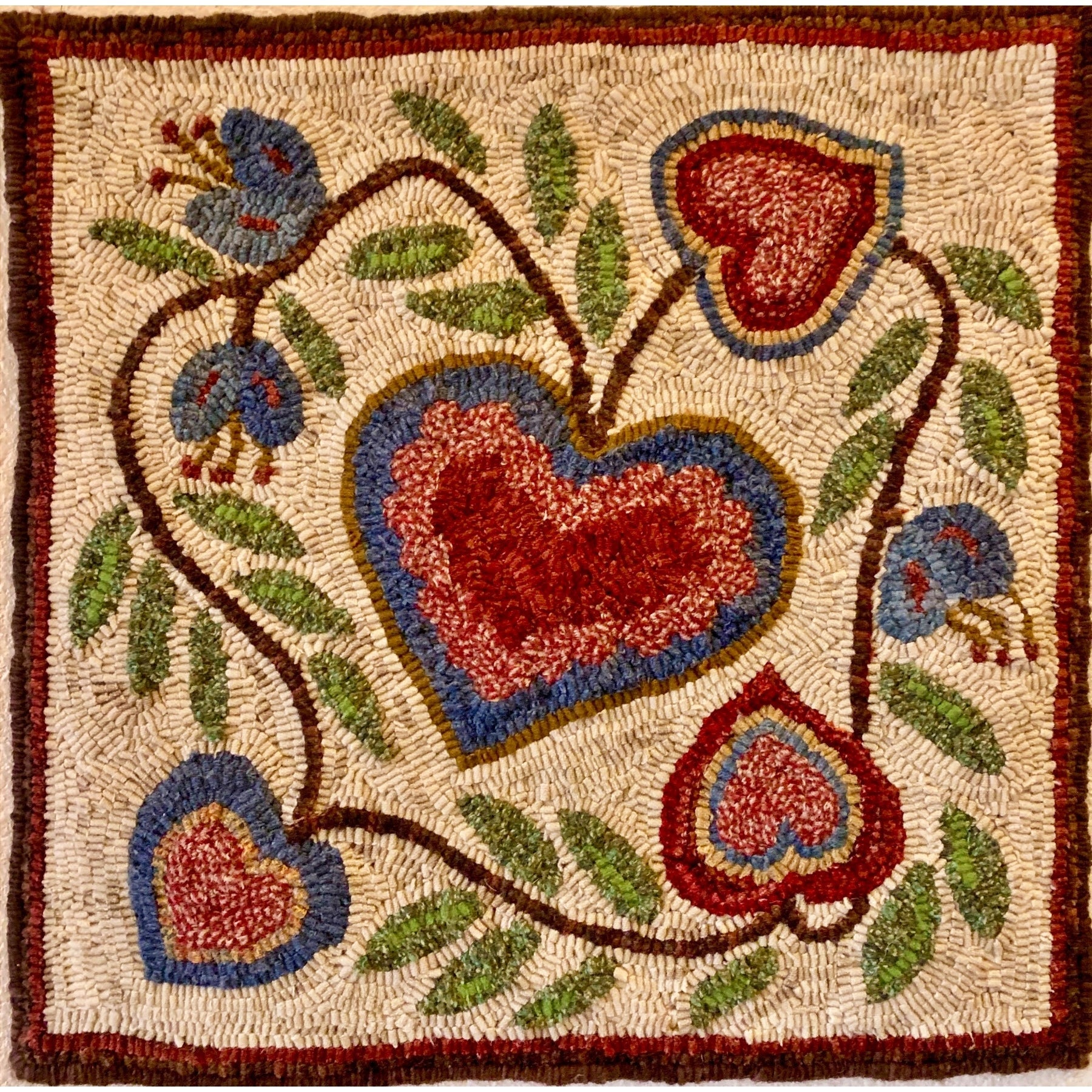 Hearts And Tulips, rug hooked by Margaret Bedle
