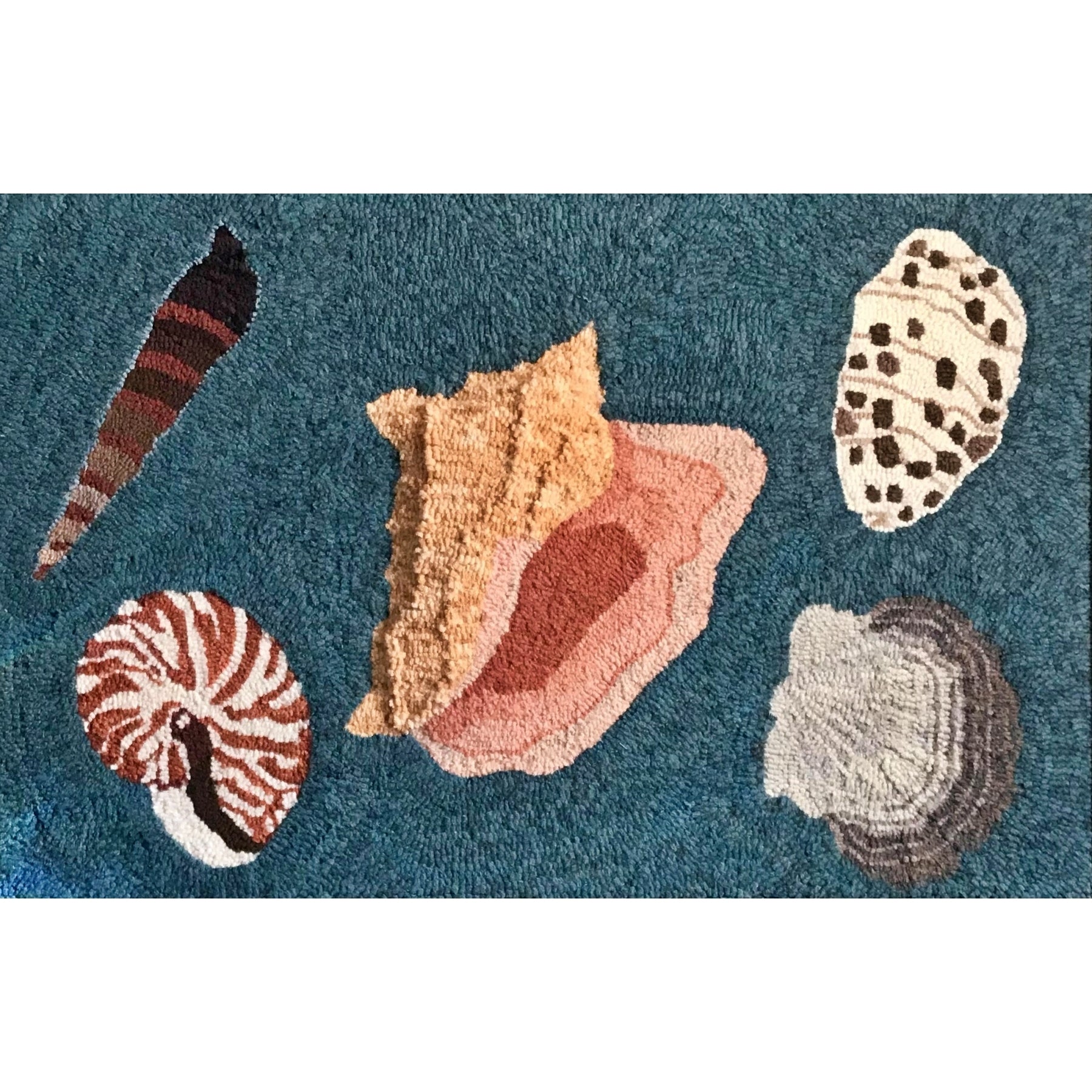 Seashells, rug hooked by Kelly Hoard