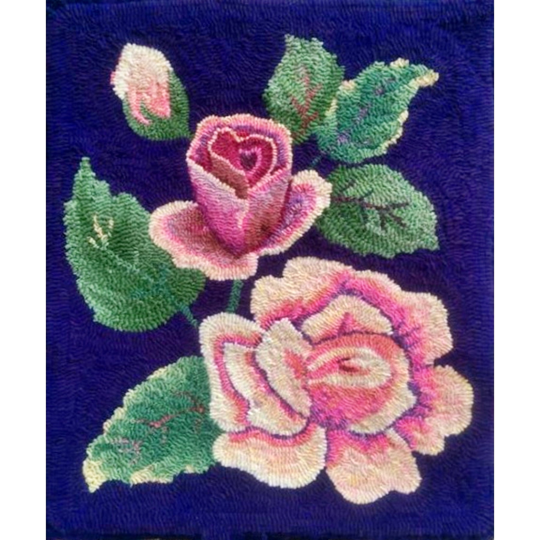 Rose, rug hooked by Connie Bradley (adapt.)