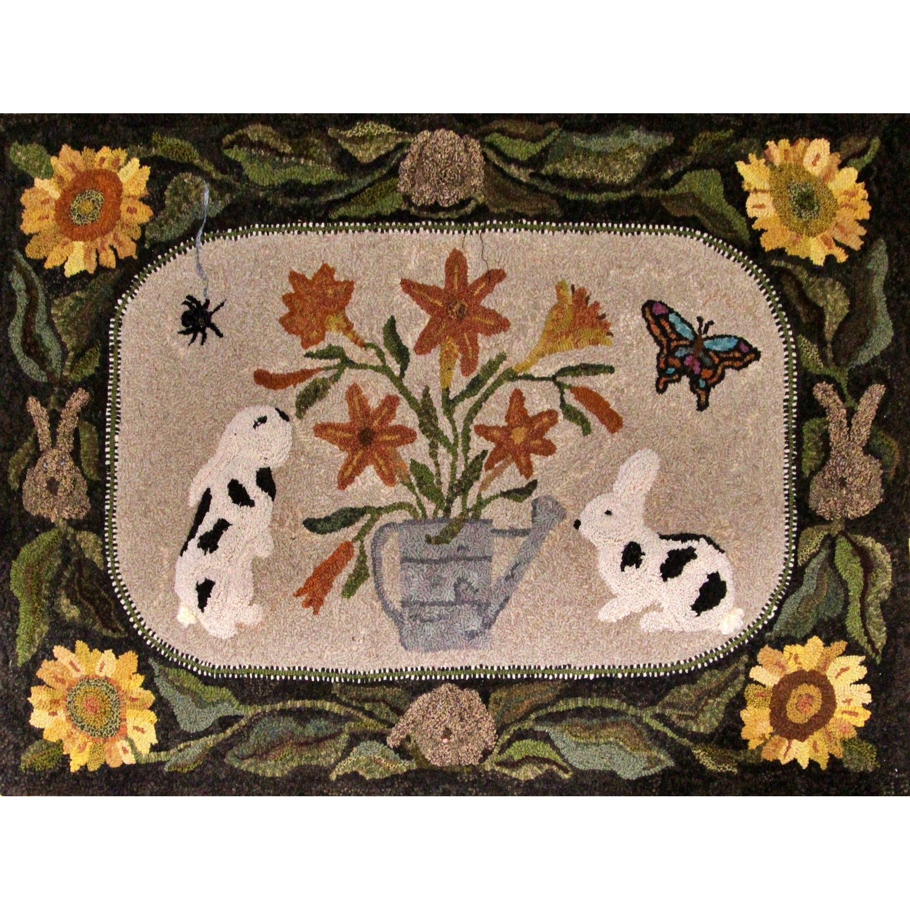 Rabbits & Lilies, rug hooked by Deb Burcin