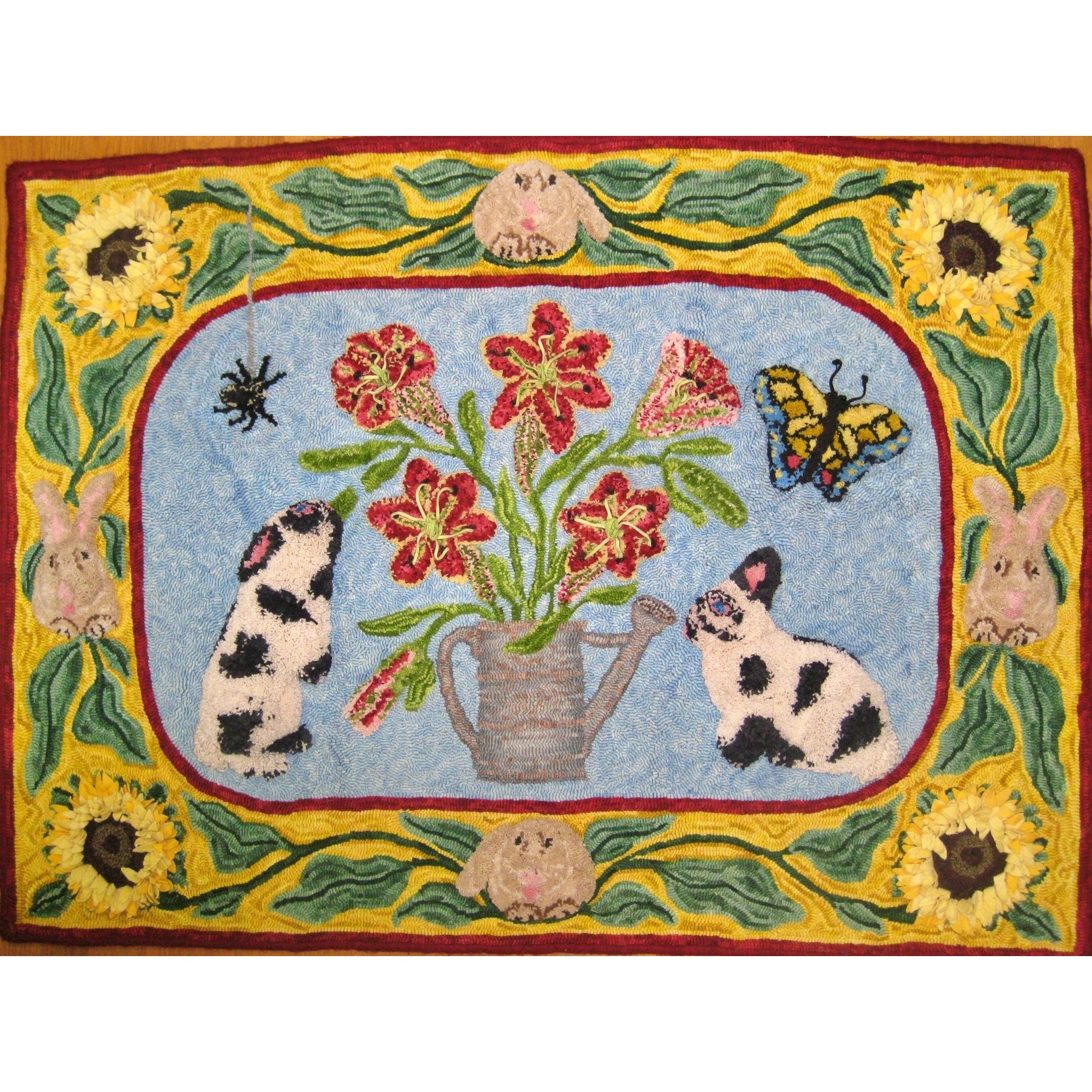Rabbits & Lilies, rug hooked by John Leonard