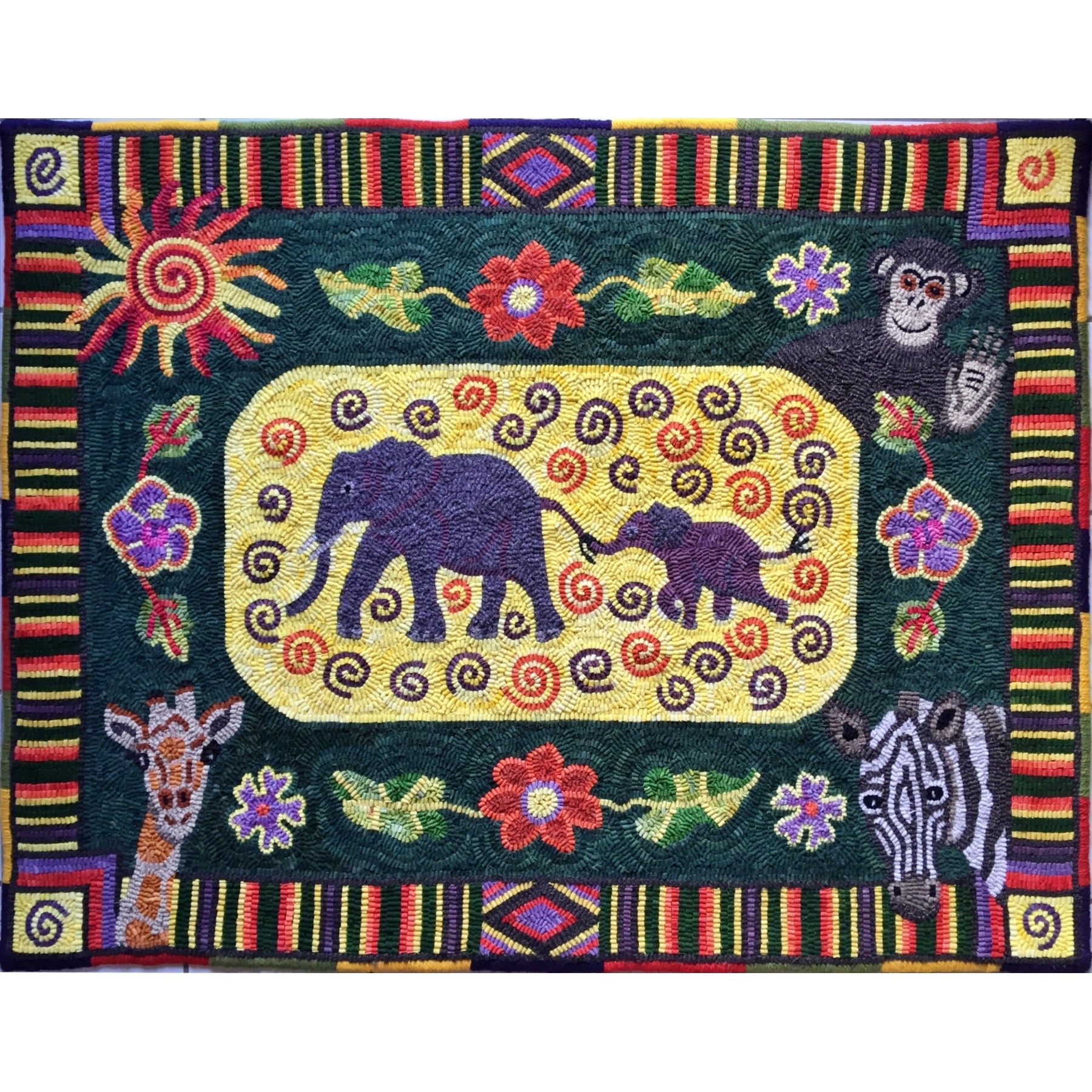 Africa, rug hooked by Delaine Miller