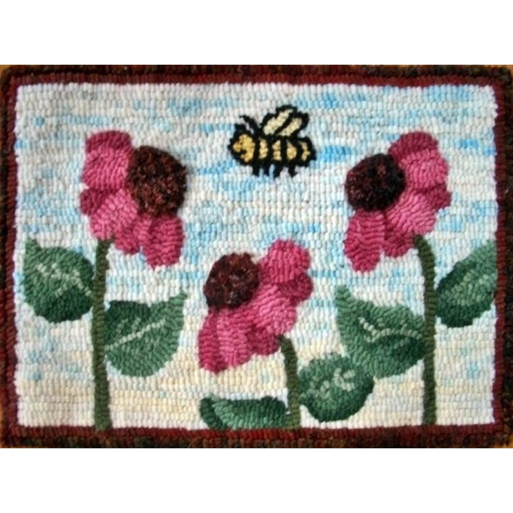3 Not Daisies, rug hooked by Connie Bradley