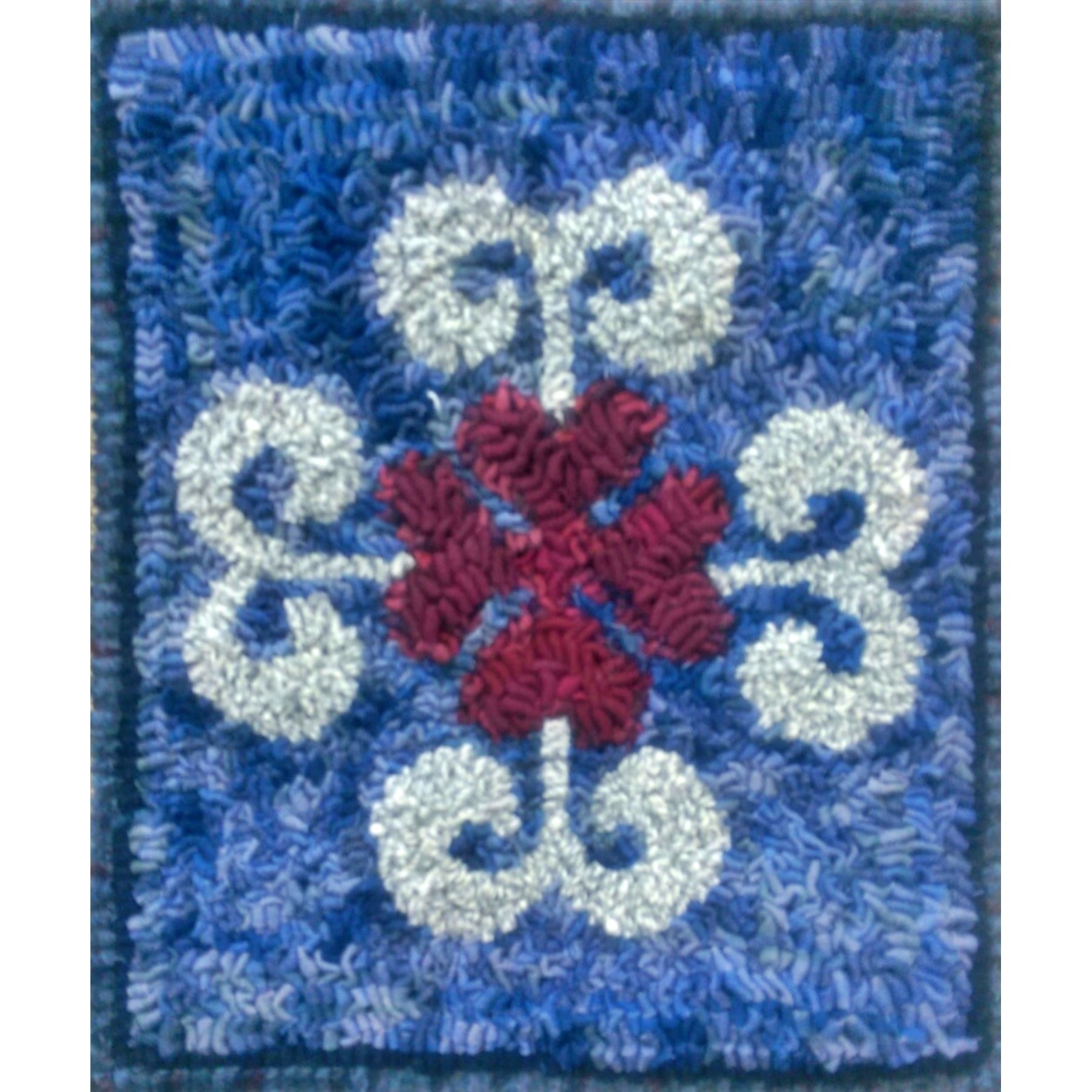 Fleur Quilt Square, rug hooked by Connie Bradley