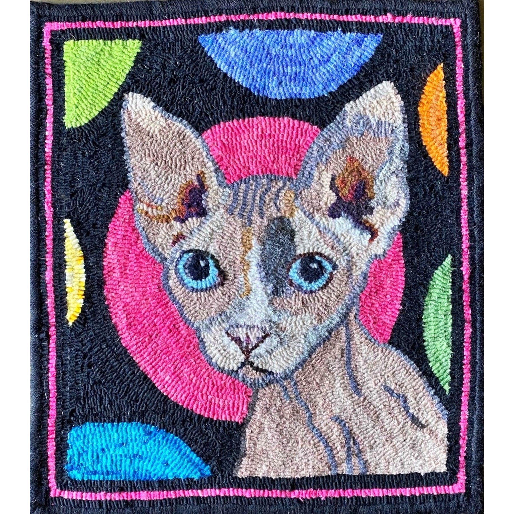 Cat, rug hooked by Kathryn Powell