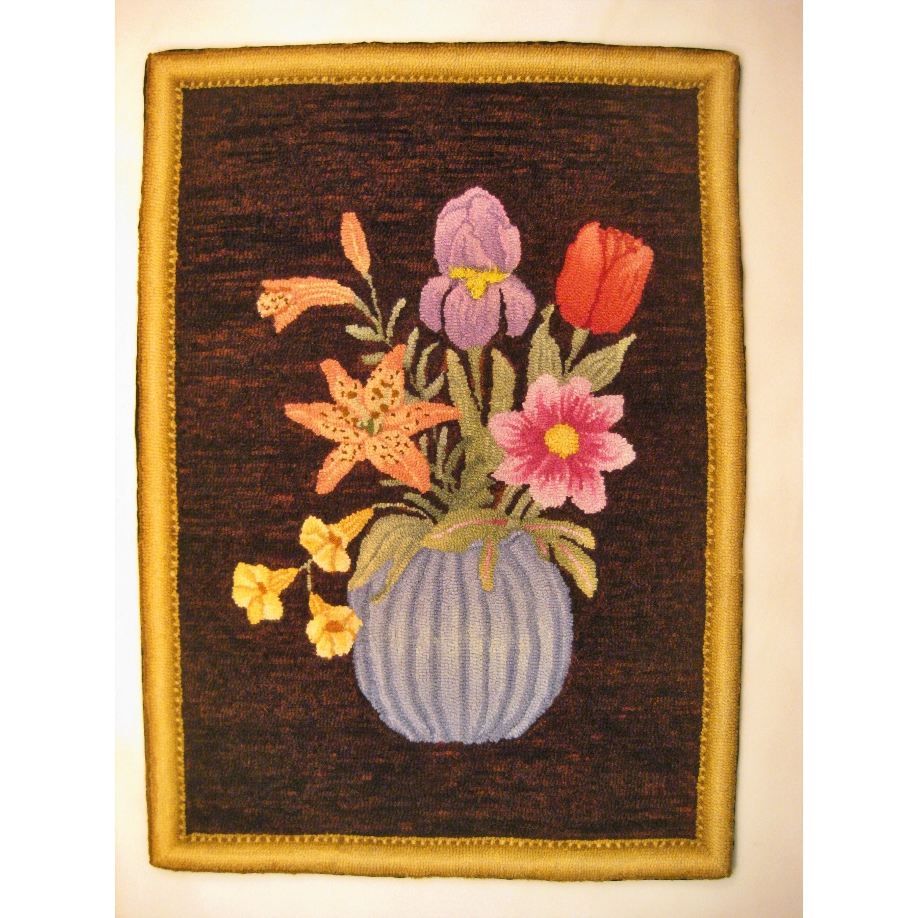 Vase with Flowers, rug hooked by John Leonard