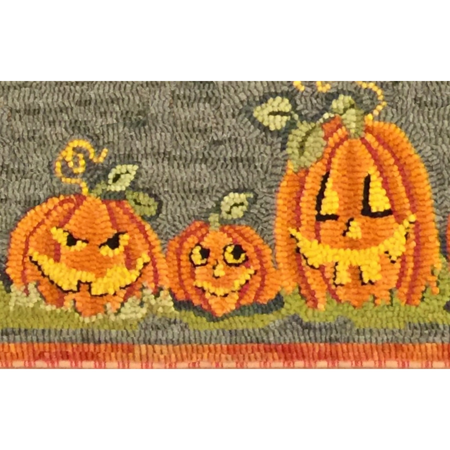 9 Jacks - 3 Pumpkins, rug hooked by Martha Lowry