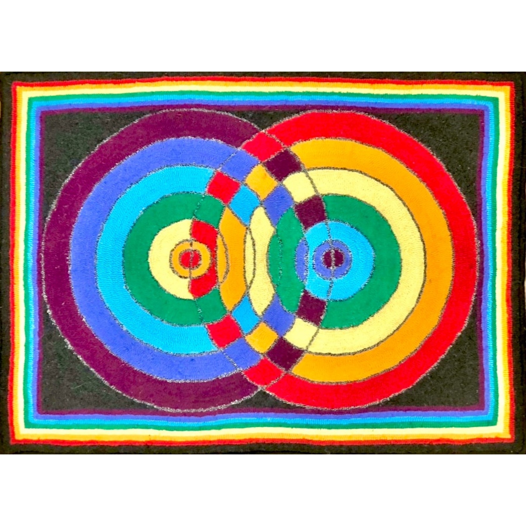 Colliding Circular Rainbows, rug hooked by John Leonard