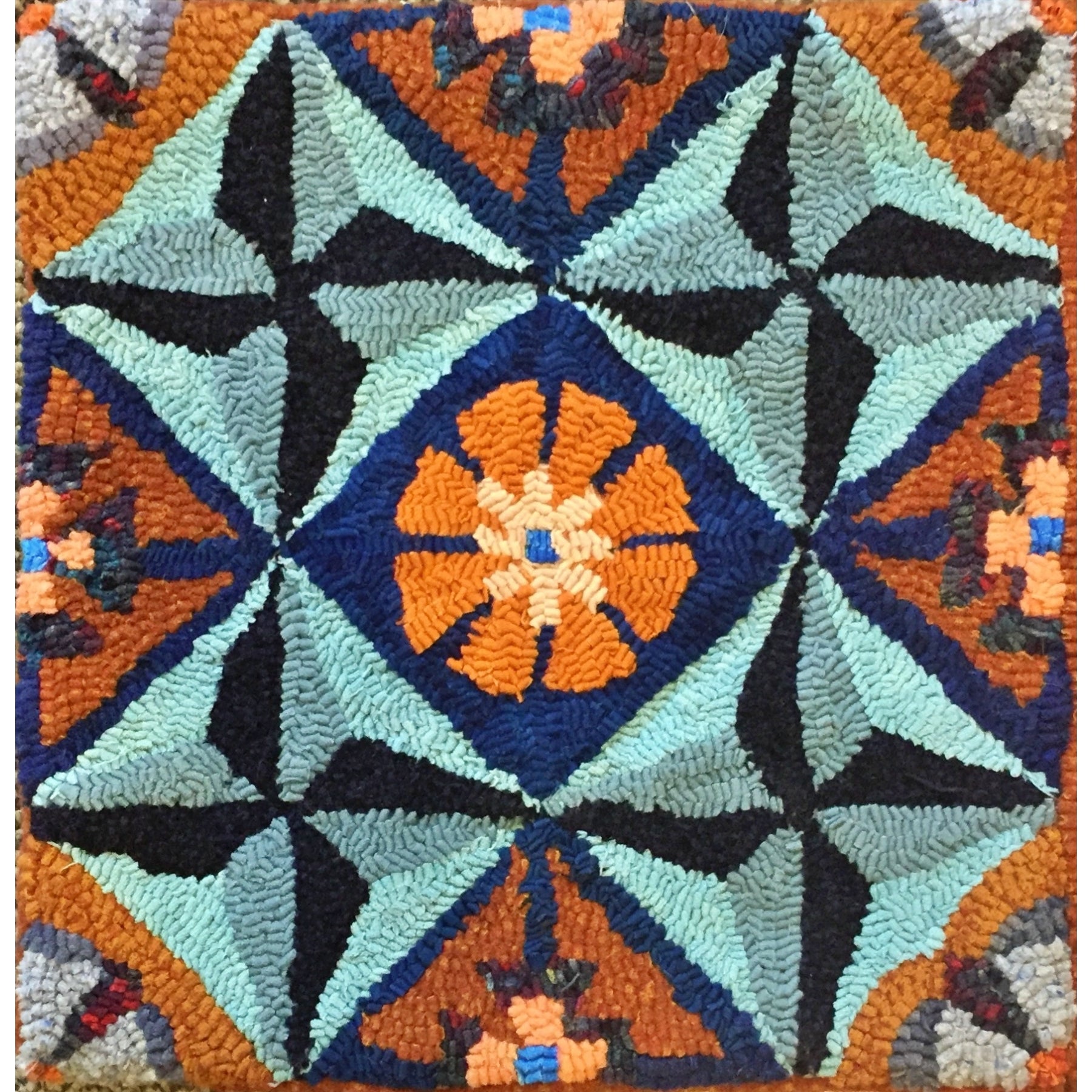 Tic Tac Toe, rug hooked by Vicki Rudolph