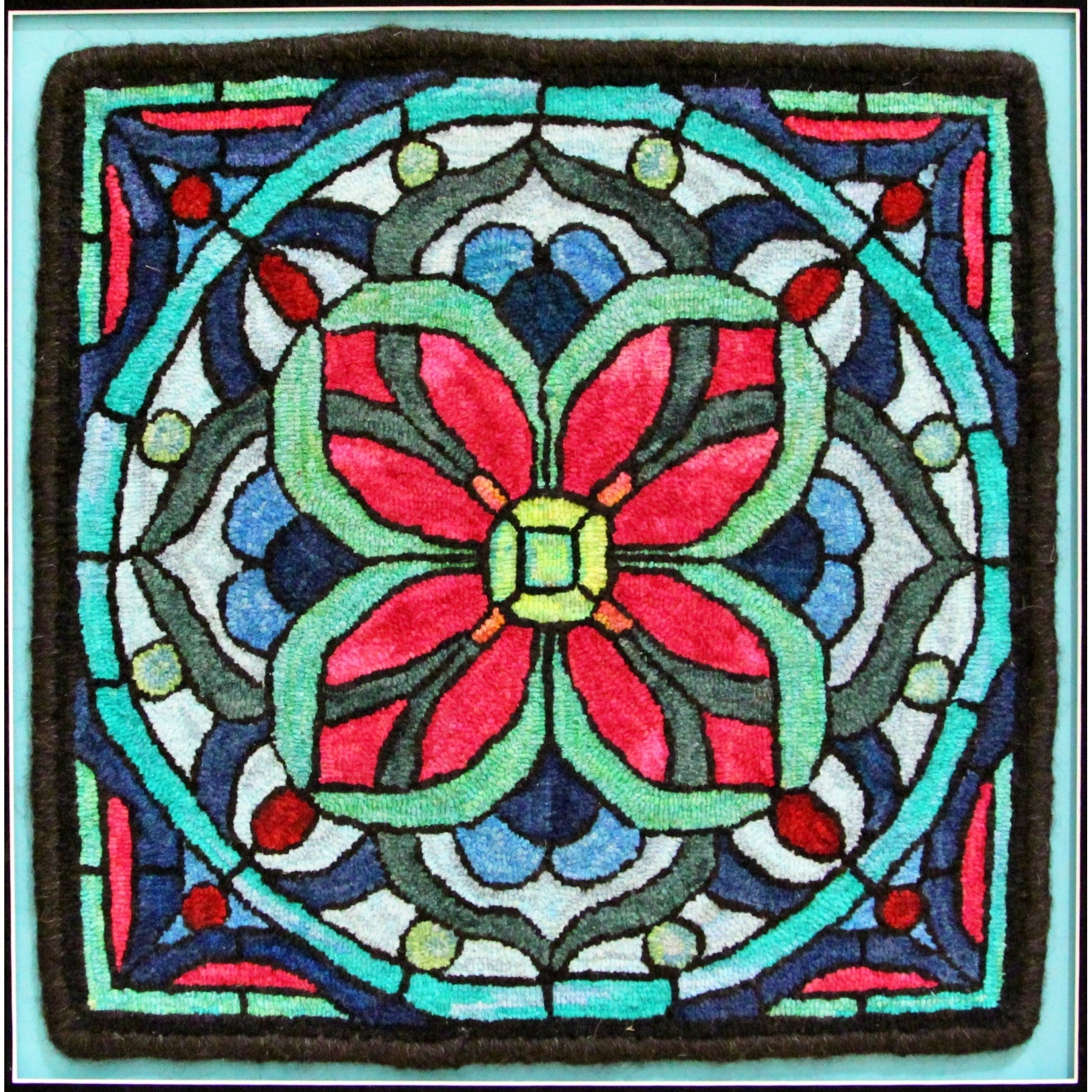 Stained Glass Mosaic, rug hooked by Pat Levin