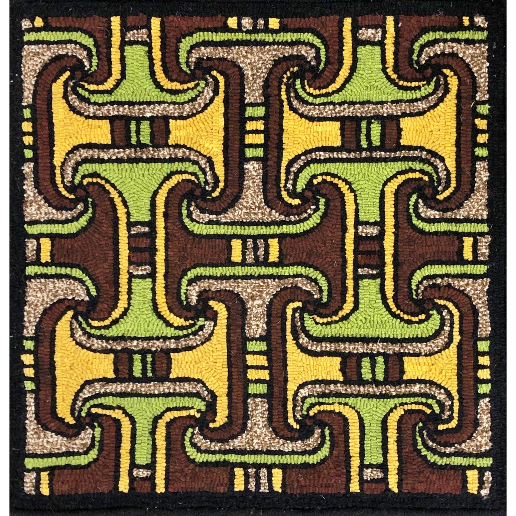 Symmetry, rug hooked by Karen Cormier